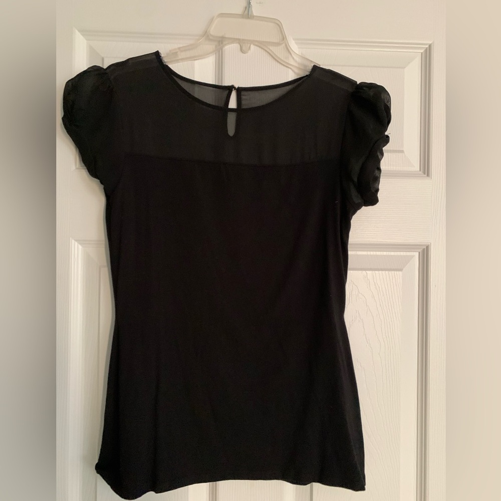 Black cap sleeve- sheer on top, button neck